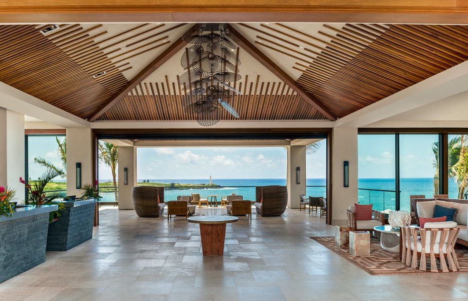 A grand, ocean-view lobby greets you upon arrival.