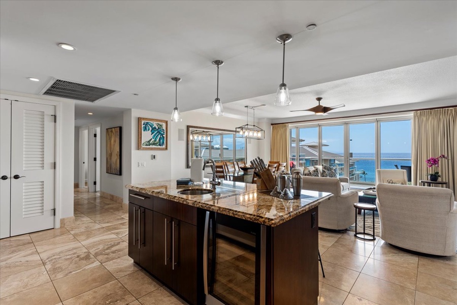 Spacious kitchen island with ocean views, perfect for meal prep or casual dining.