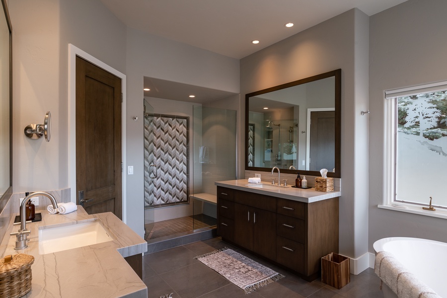 Wide vanity space and a single sink.