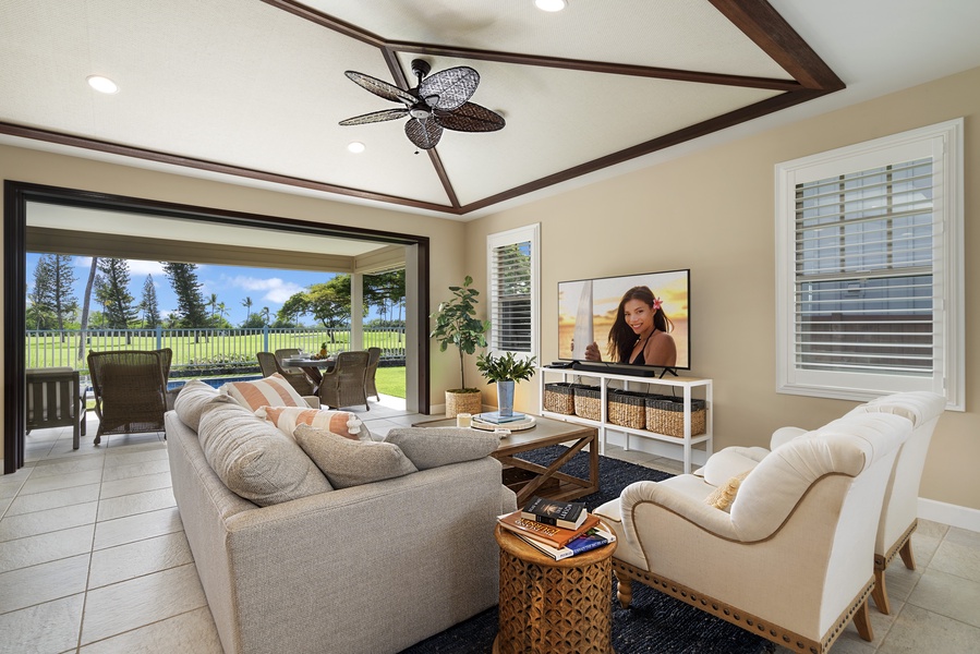Living room with plush seating overlooks the Golf Course