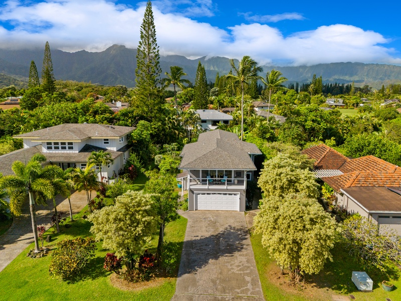 A charming aerial view showcasing the lush greenery and serene surroundings of the property.