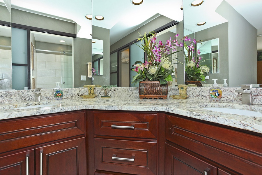 The primary guest bathroom is a luxurious full bathroom.