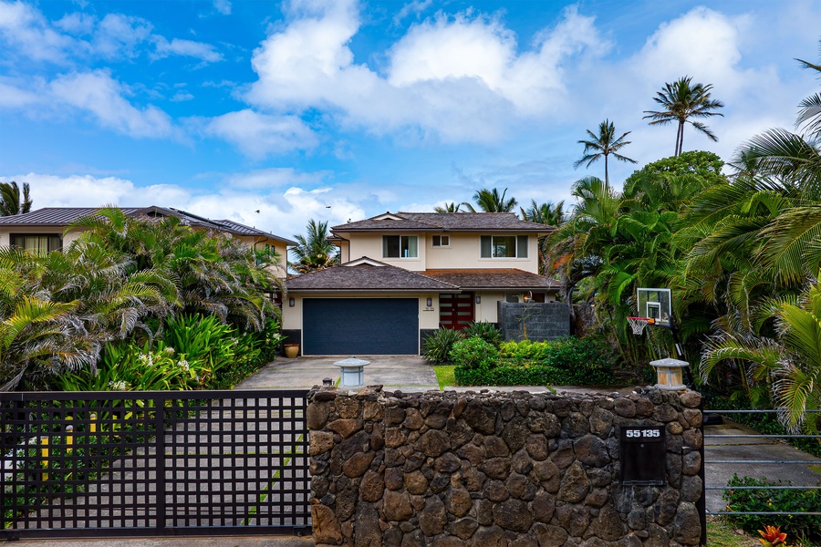 Covered garage and ample parking space.