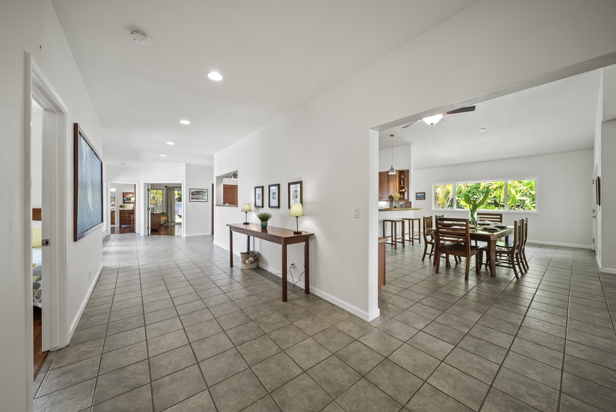 Entry hallway opens into spacious living areas with an inviting island vibe.