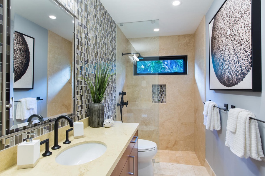 Beautiful shared bath for bedrooms three and four.