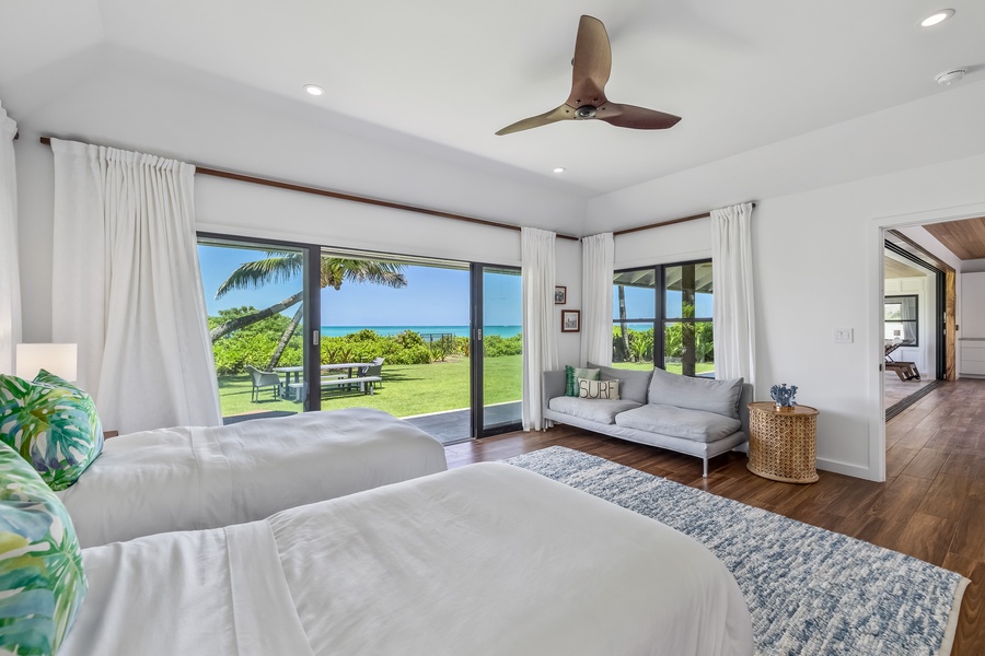 Relax and feel the breeze at Makai North suite with easy outdoor access through sliding doors.