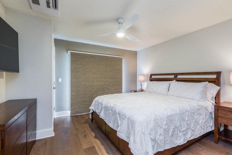 A guest bedroom at Lani Oasis with queen bed and quiet ambiance, perfect for restful nights after island adventures.