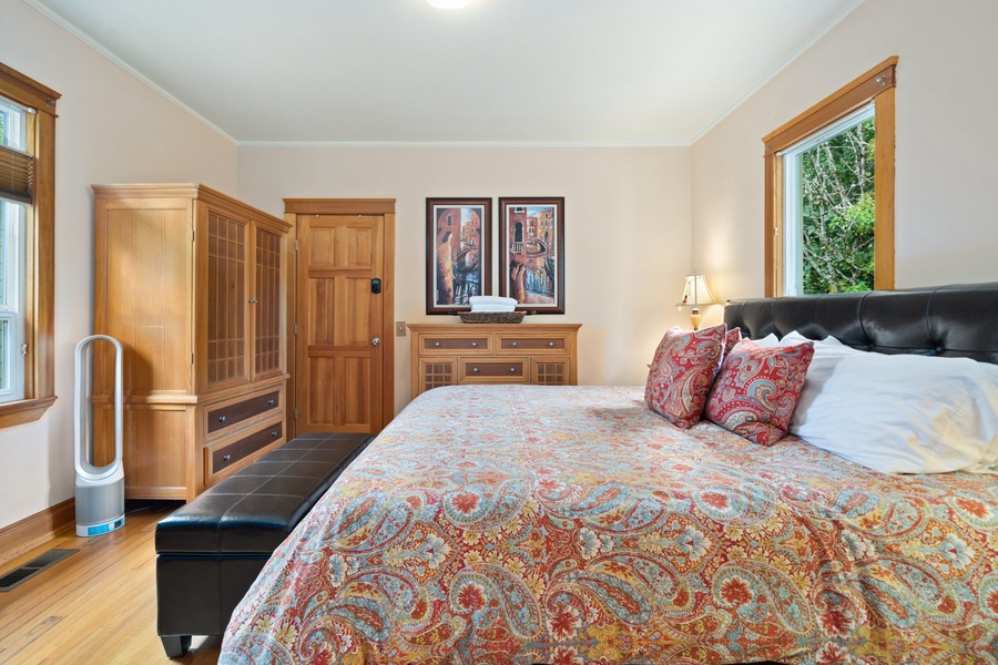 Sink into your comfortable king bed surrounded by warm wood furnishings and enjoy peaceful garden views from your windows.