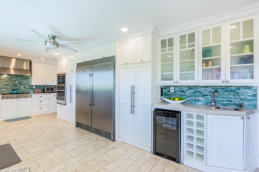 The kitchen features modern appliances and plenty of storage options.