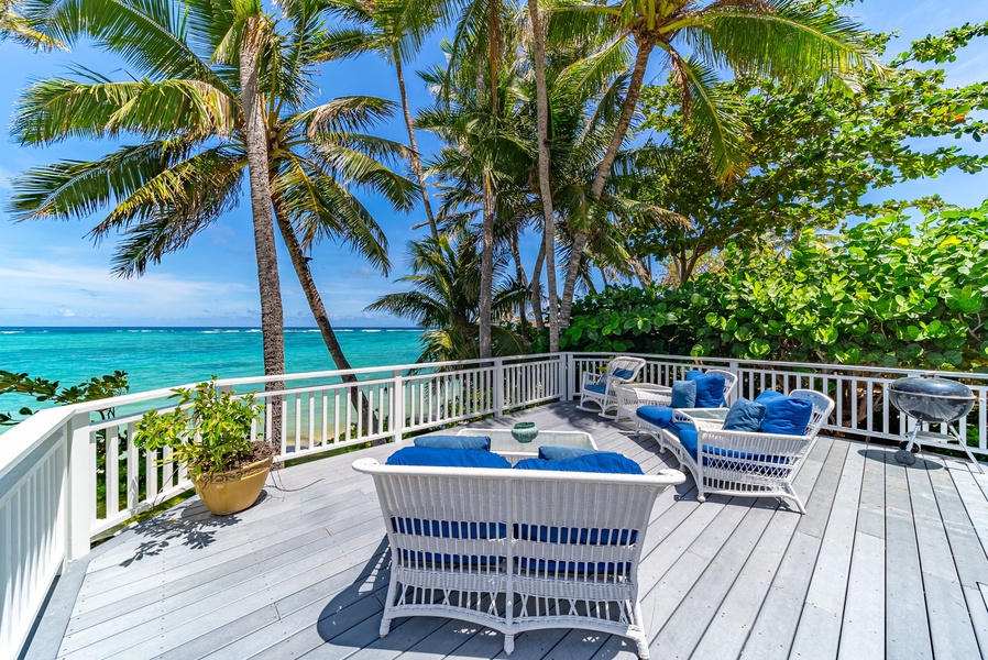 Lounge in comfort with oceanfront seating, perfect for sunsets and morning coffee.