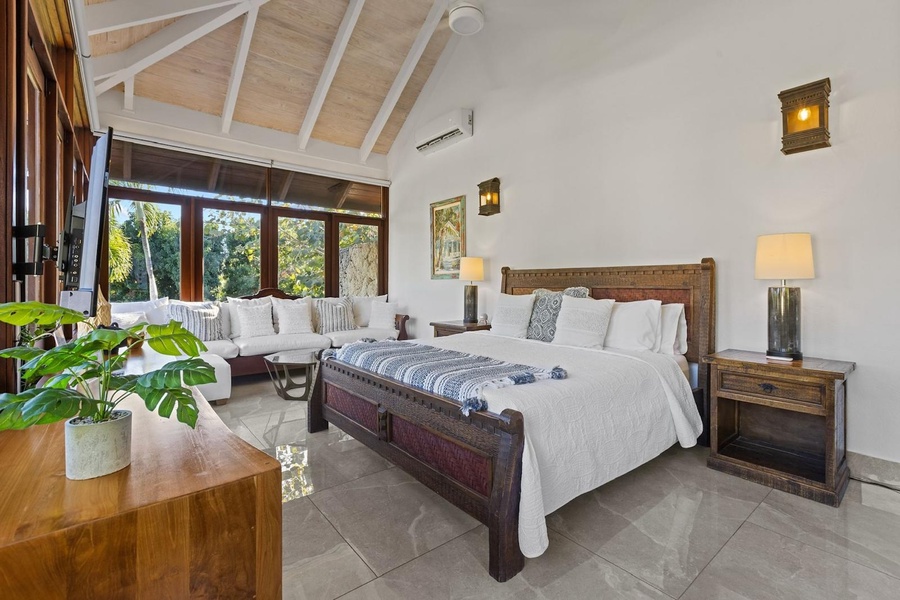 Beautiful view from the guest bedroom with comfortable bed and cozy seating area..