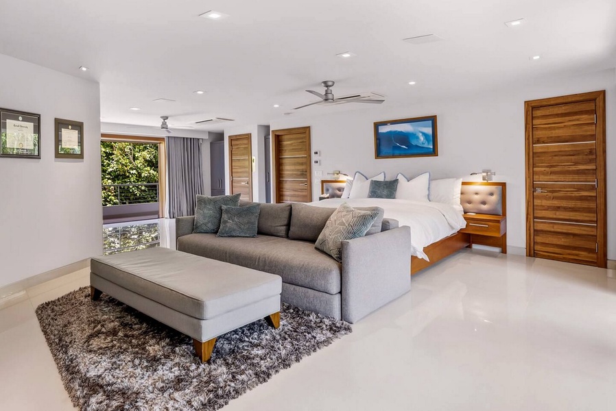 Bed on one side, sectional and screen on the other, this suite has room to spare.