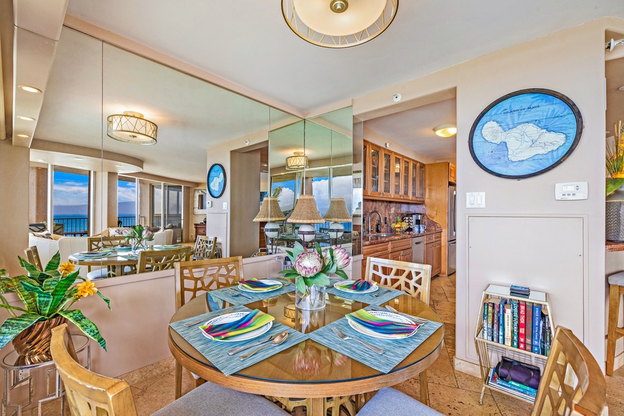The cozy dining area at Royal Kahana 610 is perfect for enjoying meals with family or friends.