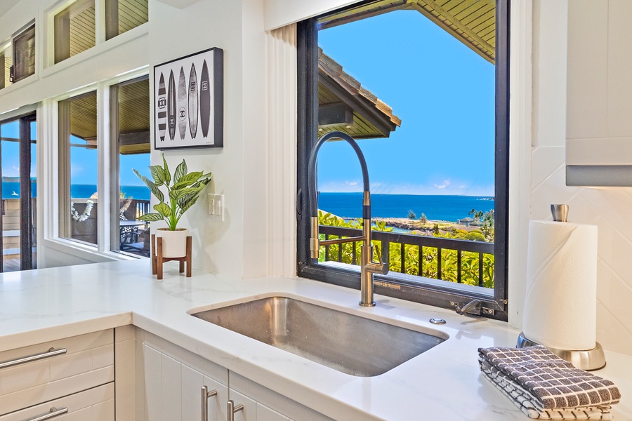 Enjoy ocean views from the kitchen sink at Kapalua Ridge 1421, making meal prep a serene experience.