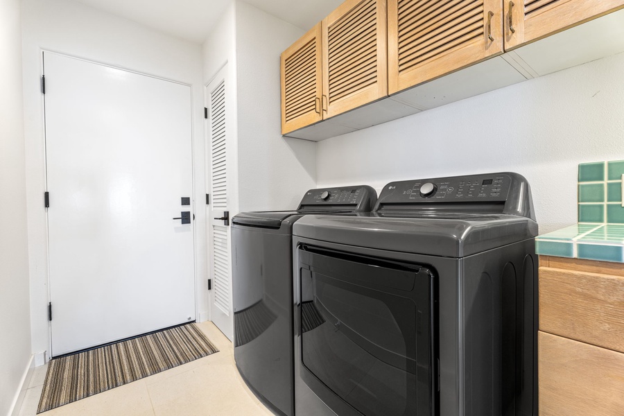 In-home laundry with ample storage and updated appliances, making longer stays and beach clean-up a breeze.