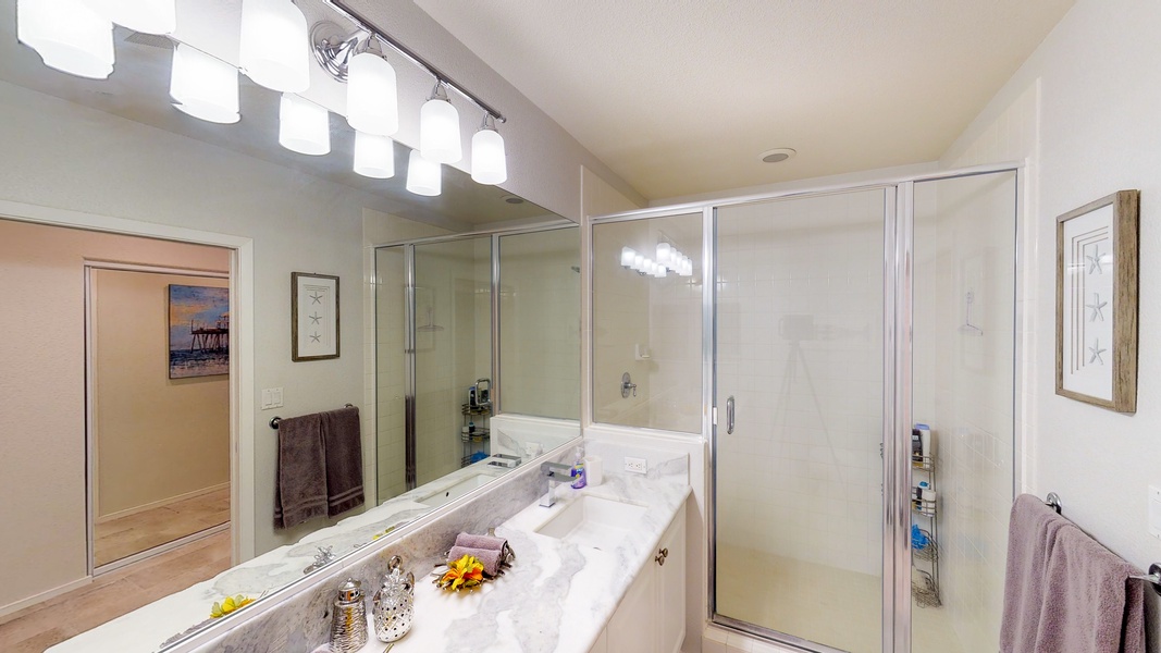 The ensuite primary guest bathroom with a walk-in shower.