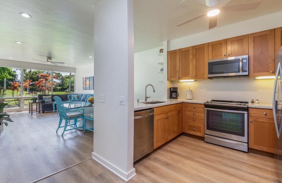 Kitchen overlooks dining and living areas