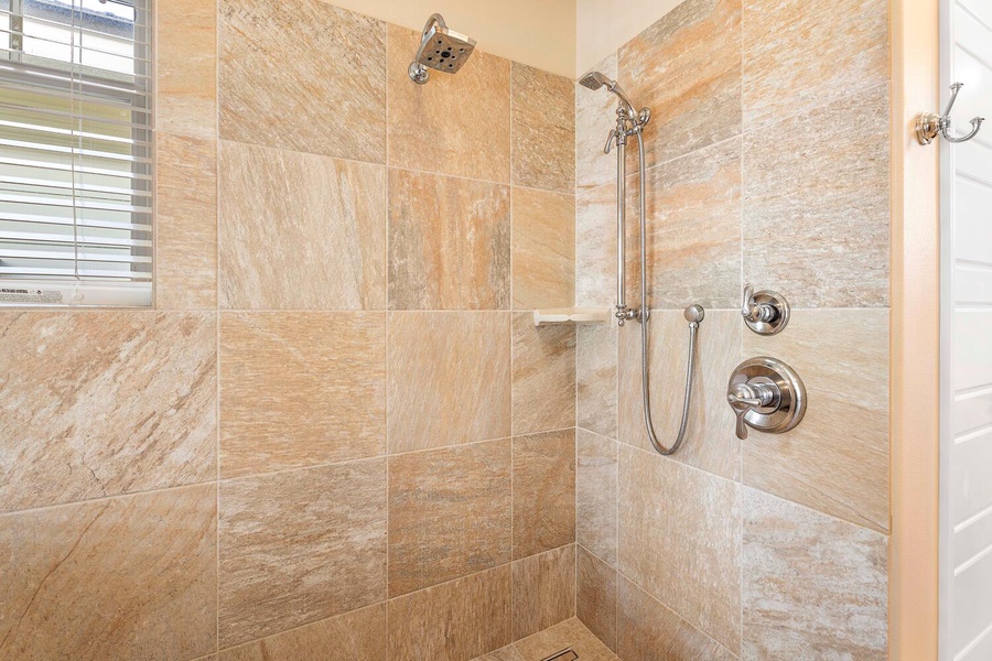 The spacious walk-in shower.