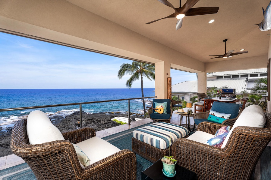 Stretch out with a novel or grab an afternoon nap beneath the ceiling fan; turtles often surface in the waves mere yards beyond the railing.