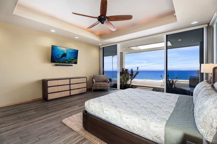 Wake up to endless ocean views from your master bedroom, where floor-to-ceiling windows frame the sparkling sea perfectly.
