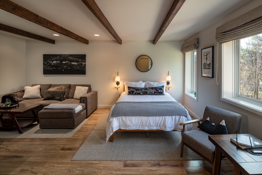 Experience a serene retreat in this elegantly designed Sun Valley Atelier, where rustic wooden beams meet modern comforts.