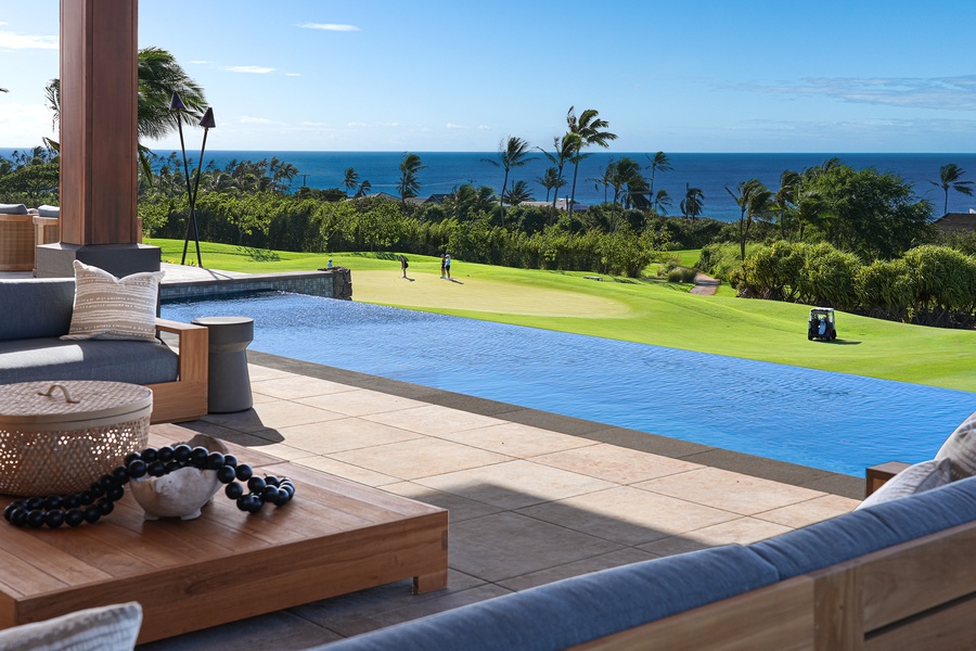 Savor breathtaking ocean views from the infinity pool and lanai, a true tropical oasis.