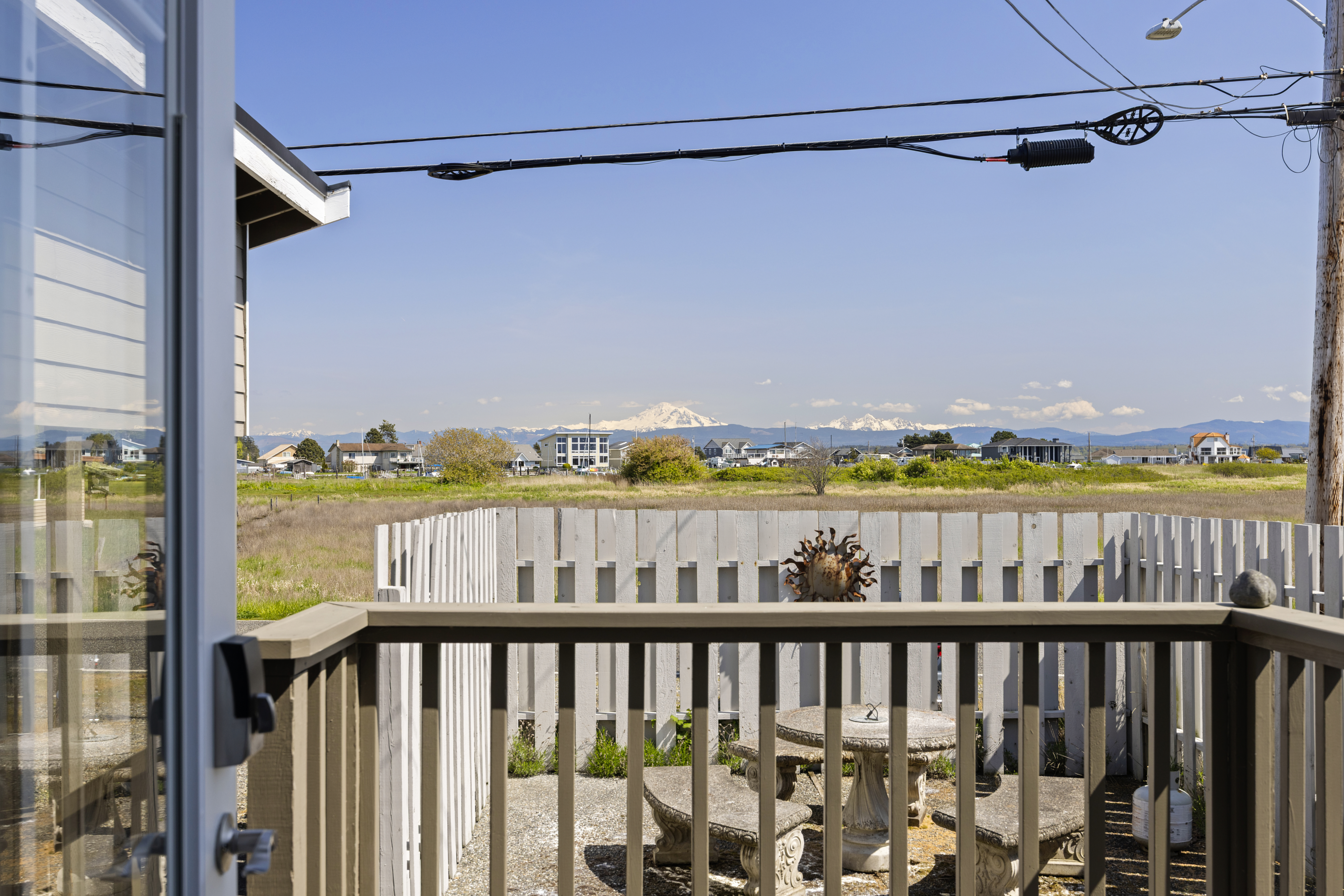 Step outside from the home office to enjoy panoramic views of the water and surrounding islands.