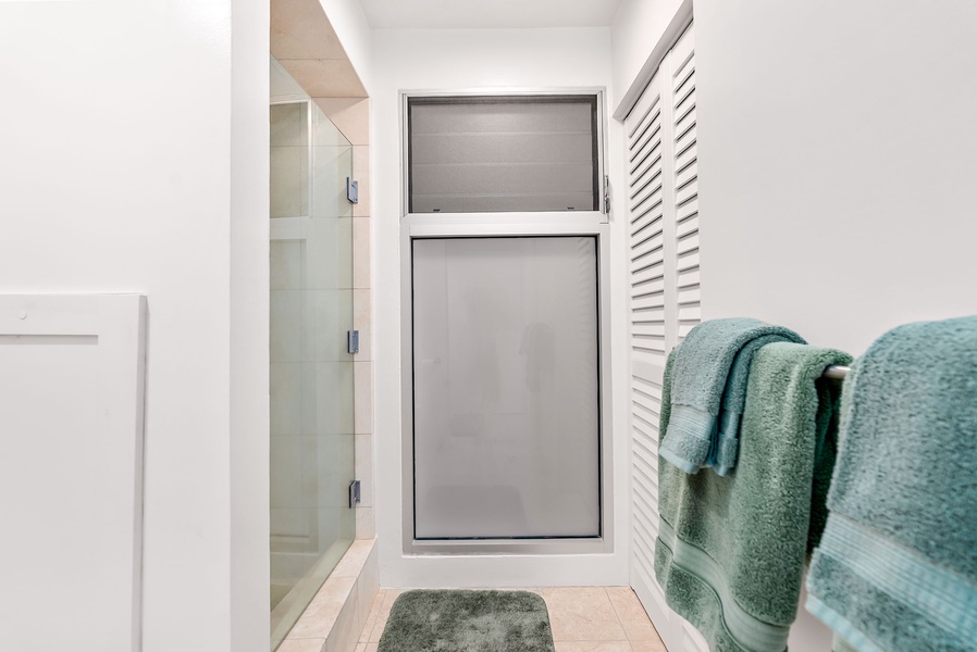 Spacious en-suite with upgraded fixtures and thoughtful layout for your guests’ convenience.