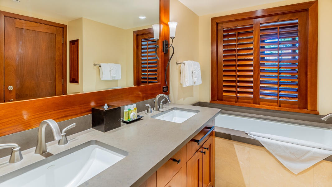 The primary guest bathroom with a soaking tub to relax and renew.