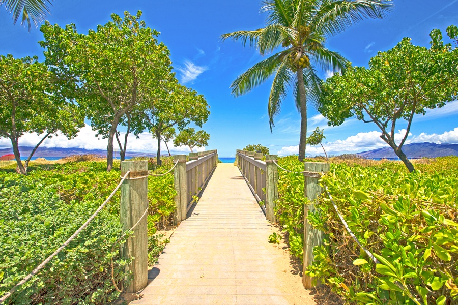A boardwalk from Honua Kai Konea leads directly to the golden sands of Kā‘anapali