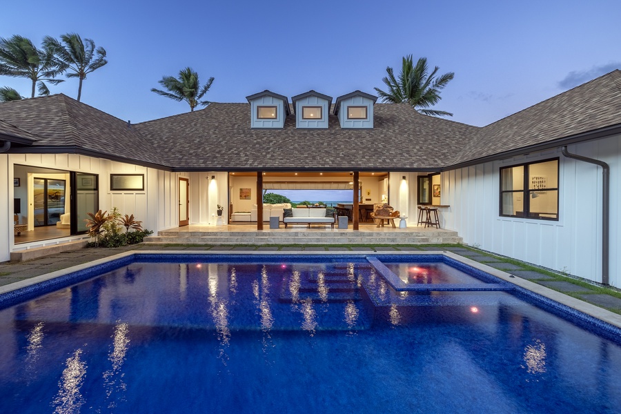 Twilight view of the pool  center
