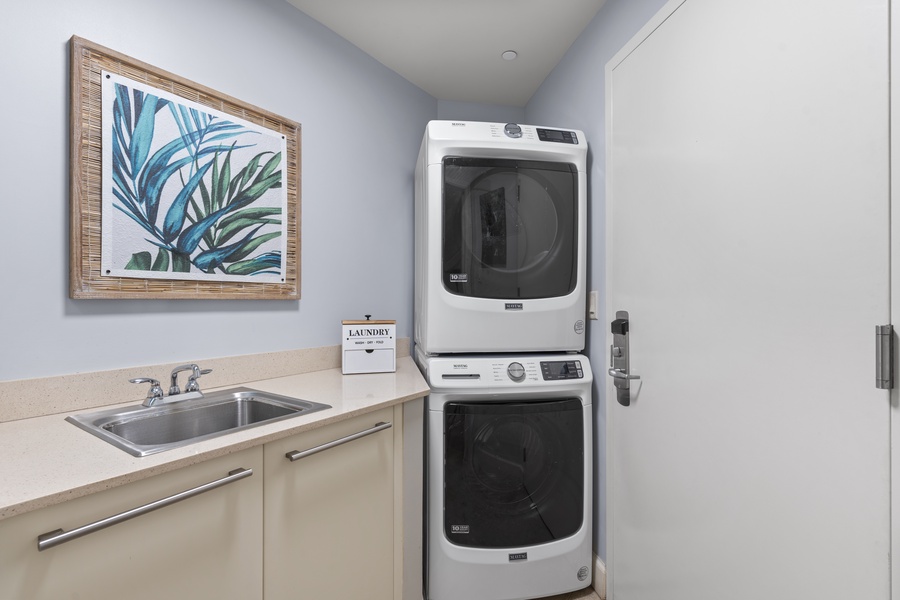 Enjoy the ease of full laundry amenities at Wailea Luxury Residence Hoolei 23-3 with modern appliances.