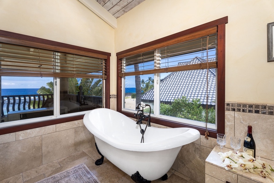 Clawfoot soaking tub with ocean views—unwind in a spa-like setting right off the primary suite.