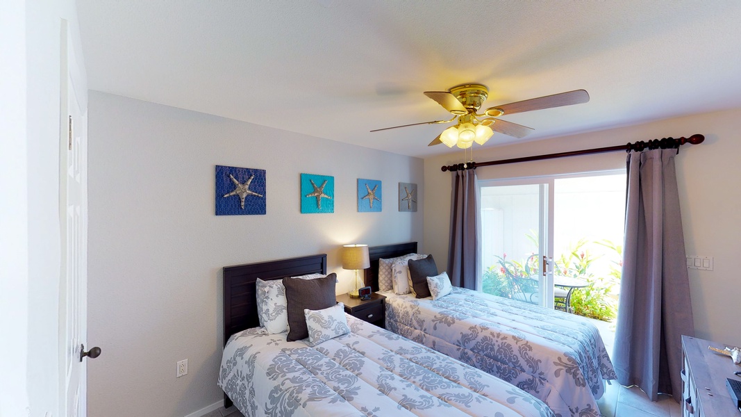 The second guest bedroom with access to the lanai.