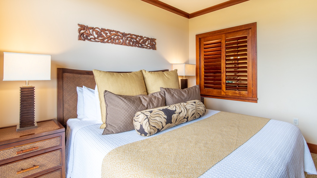 The primary guest bedroom with soft comfortable amenities.