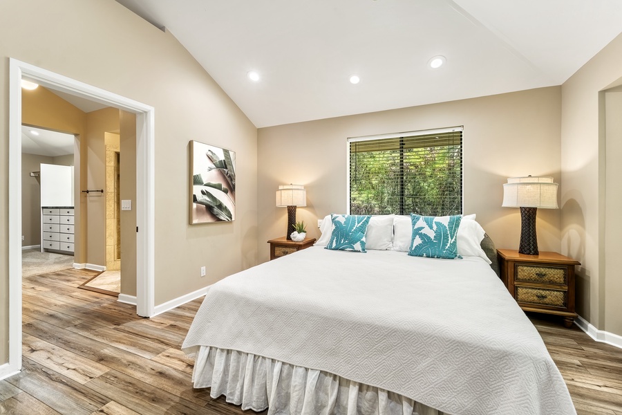 Large bedroom with views of the mature landscape is the perfect place to lay your head