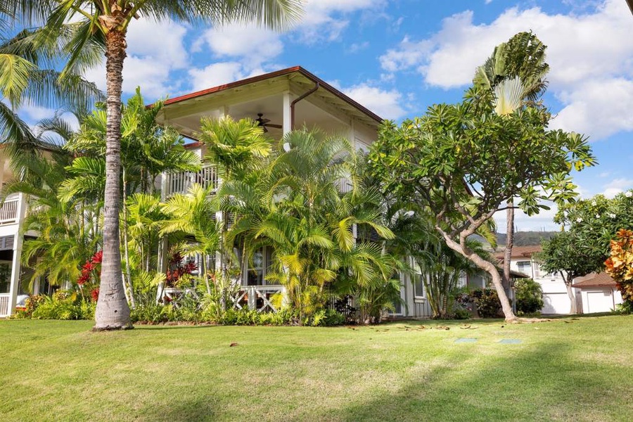 An outside view of the manicured lawns around the condo.