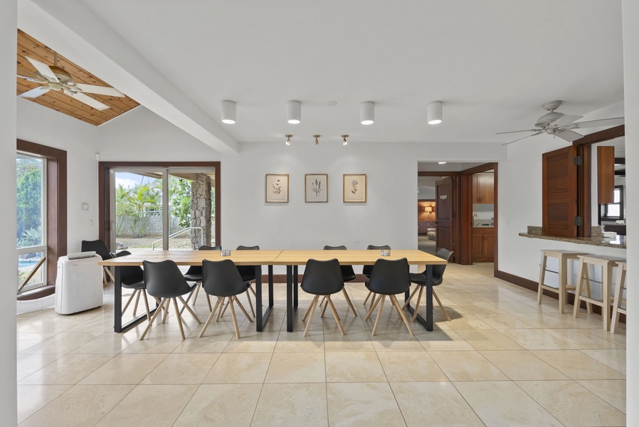 Stylish indoor dining area with seating for ten and easy access to the kitchen.