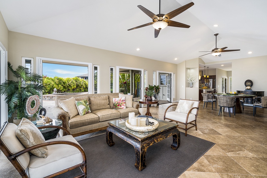 Spacious living room tropically appointed!