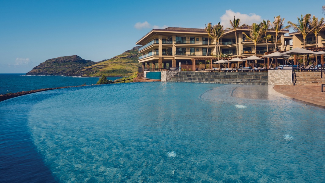Spend your days oceanfront, in the two-tiered, infinity-edge pool.