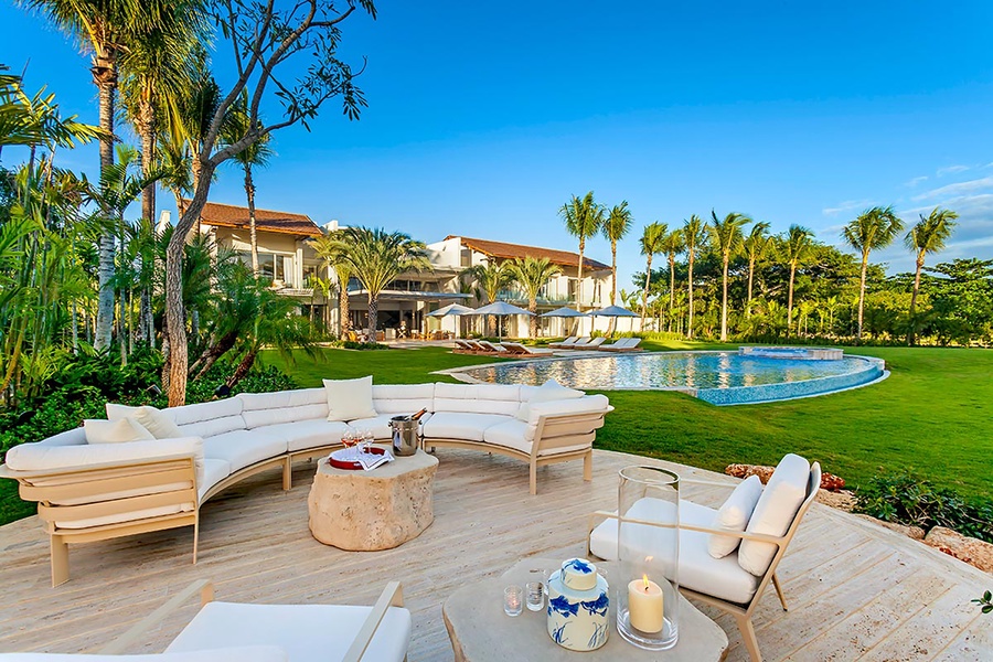 Relax in style on the outdoor lounge, perfect for enjoying the sunset with a cool drink by the pool.