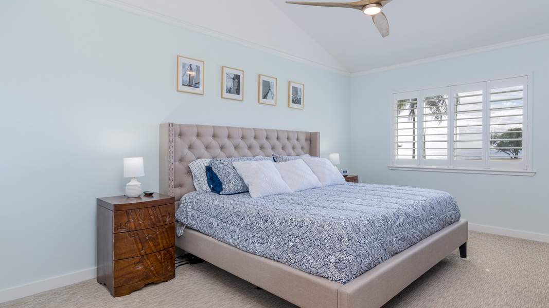 The primary guest bedroom is comfortable and spacious for a restful slumber.