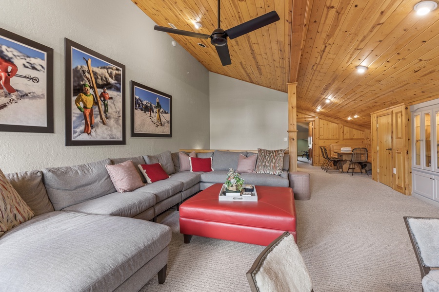 Cozy family den with sectional sofas to watch a family movie or the big game