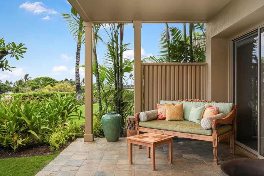Enjoy tranquil moments in the private lanai with a cool drink.