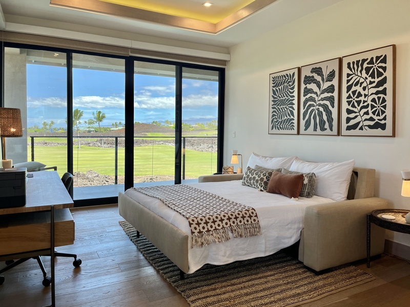 Versatile room with the sofa converted into a full bed, offering comfortable accommodations alongside modern décor and private lanai views.