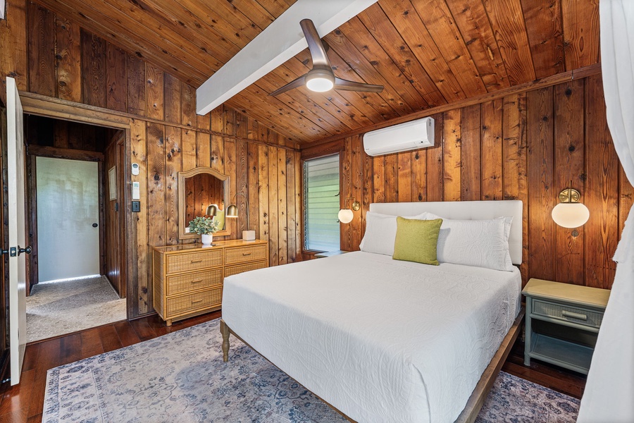 Drift into peaceful dreams in your retreat, where crisp linens and cabin charm create the perfect mountain getaway sanctuary.