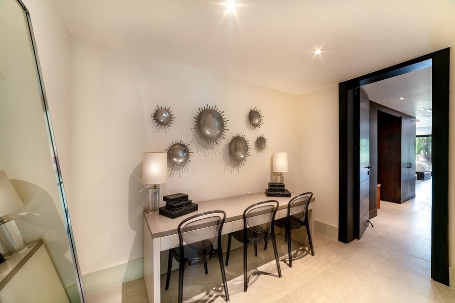 Work in this chic office space featuring modern decor and ample lighting for a productive environment.