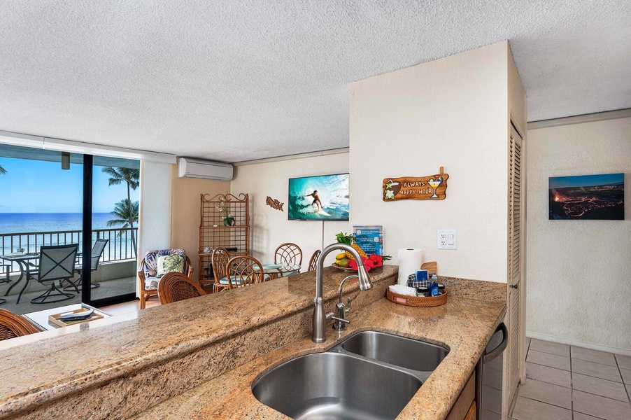 Prepare meals conveniently with wide counter spaces on the kitchen area.