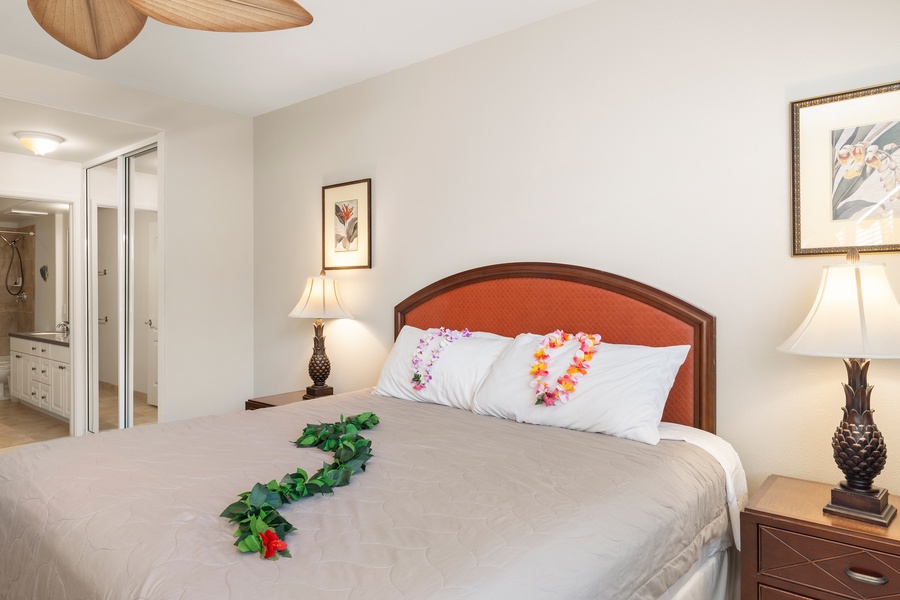 Slip into your comfortable bed adorned with tropical touches and fresh linens, creating the perfect island retreat atmosphere for restful nights.