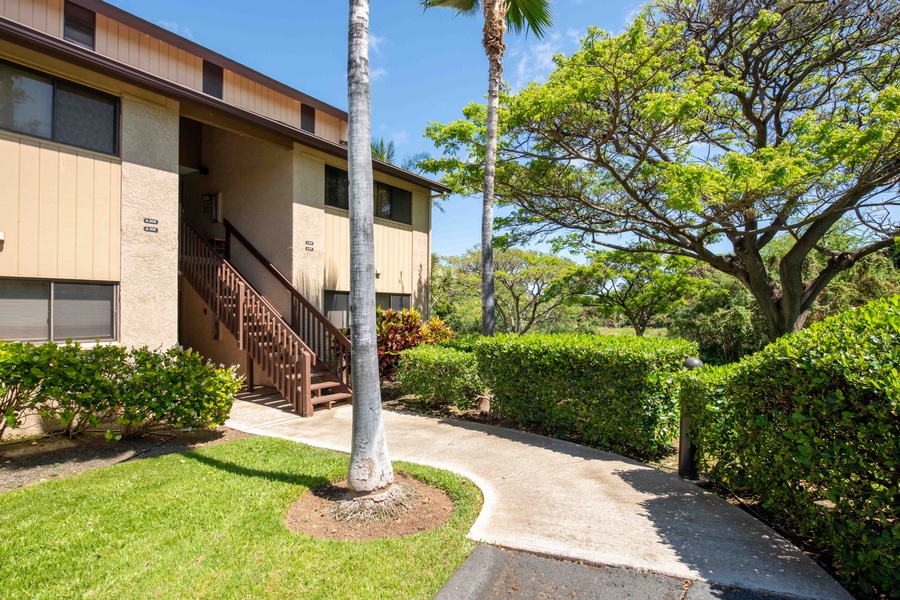 Welcome to your island retreat—this ground-floor condo offers easy access and a peaceful path through lush landscaping.